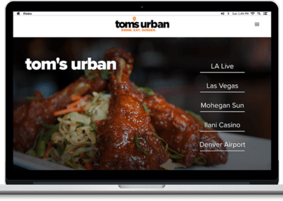Tom's Urban Restaurant Website Laptop